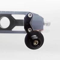 Support de fixation des diabolos sur le tendeur de chaine